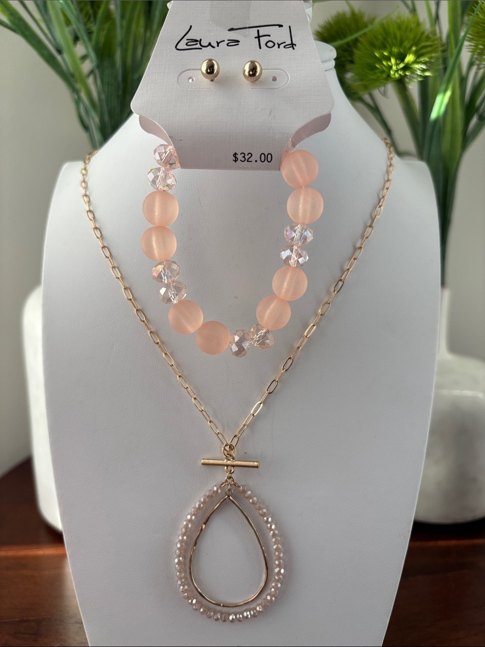 Laura Ford Goldtone open teardrop rhinestone pendant,light peach bracelet,post